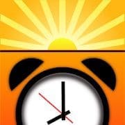 Alarm clock with a rising sun above it.