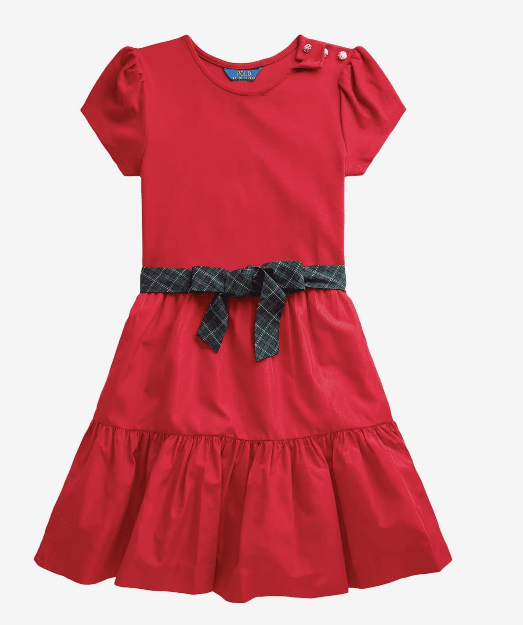 Red dress with a black and white patterned bow and ruffled hem.