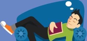 Man sleeping on a blue chair with a book on his chest.