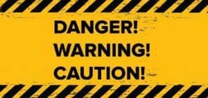 Yellow and black hazard stripes with the words "DANGER! WARNING! CAUTION!