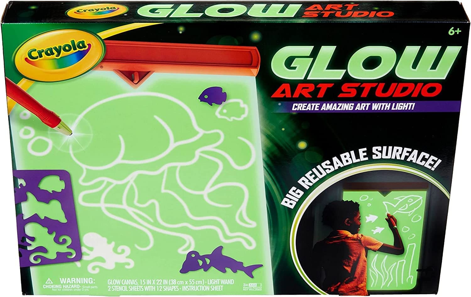 Crayola Glow Art Studio box with a child drawing on a light-up surface
