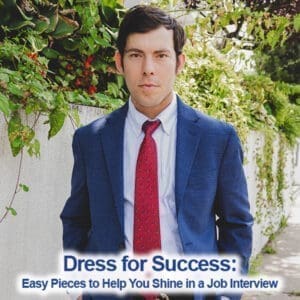 Bradley in a navy suit and red tie for a job interview.