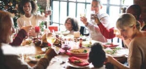 Family celebrating around a holiday dinner table