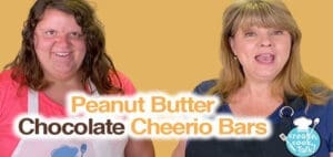 Two women smile against a yellow background with the text "Peanut Butter Chocolate Cheerios Bars" overlaid.
