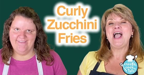 Two women smiling with "Curly Zucchini Fries" text overlay