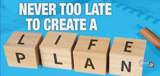 Four wooden blocks spell "LIFE PLAN" with the text "NEVER TOO LATE TO CREATE A" above.
