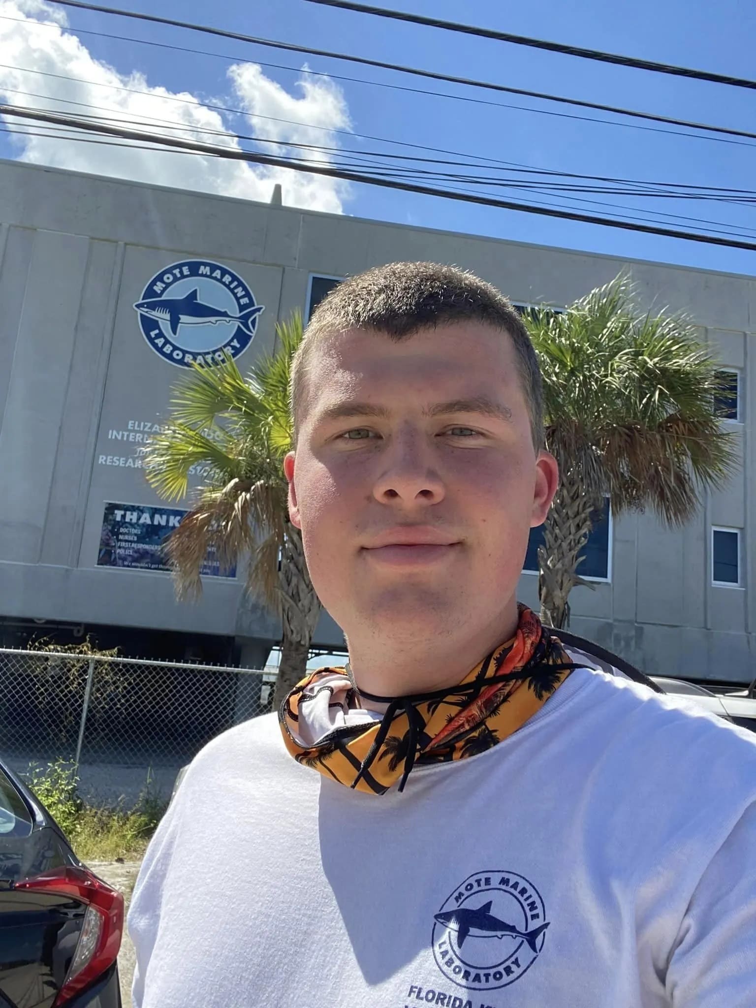 Clayton Mote Marine in front of a building.