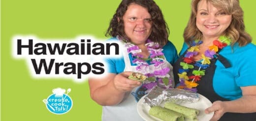 Two women holding Hawaiian wraps.
