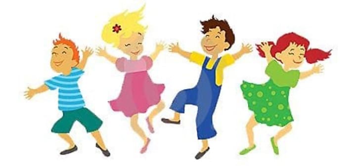 Four children with arms outstretched are dancing joyfully.