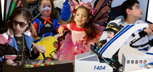 Children in costumes are gathered together.