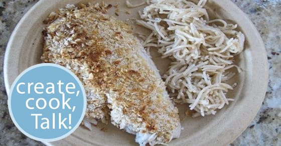Panko crusted fish with shredded noodles on a plate