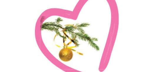 A pink heart outlines a Christmas tree branch with a gold ornament.