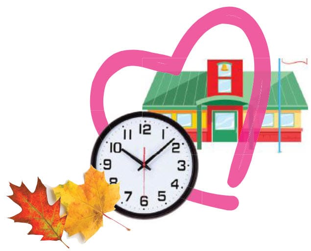 School building with a clock and autumn leaves inside a heart shape