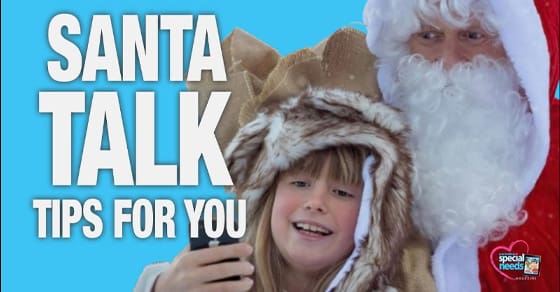 A young girl in a fur hat takes a selfie with Santa Claus.