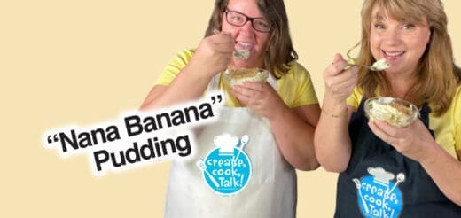 Two smiling women eat banana pudding.