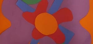 Abstract cutout flower with orange center on purple background