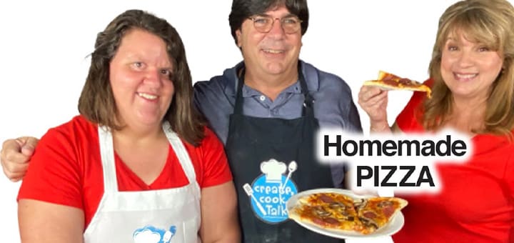 Three people wearing cooking aprons holding homemade pizza slices.