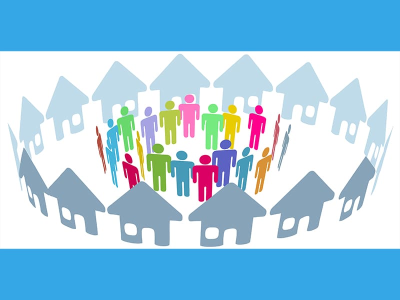 Colorful people icons stand in a circle surrounded by house icons.