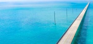 Seven Mile Bridge in the Florida Keys stretches across bright blue water.