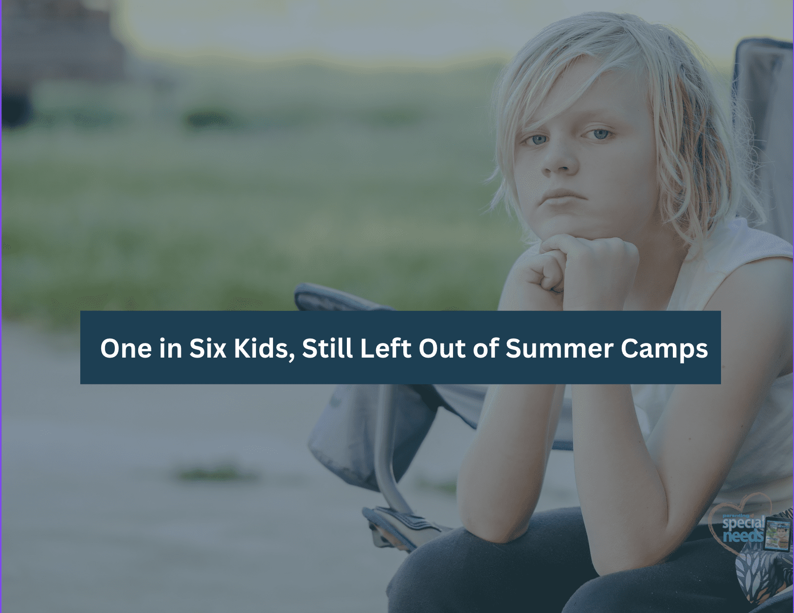 A young person sits outside with a sad expression.
