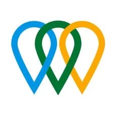 Three interlocking map marker shapes in blue, green, and yellow.
