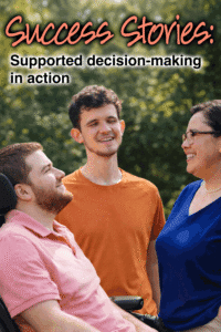 Barrett in a wheelchair with two other people, all smiling outdoors.