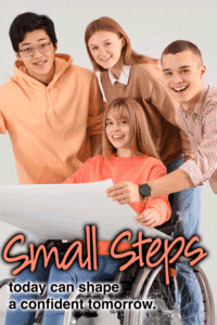 Four young adults smile while looking at a blueprint.